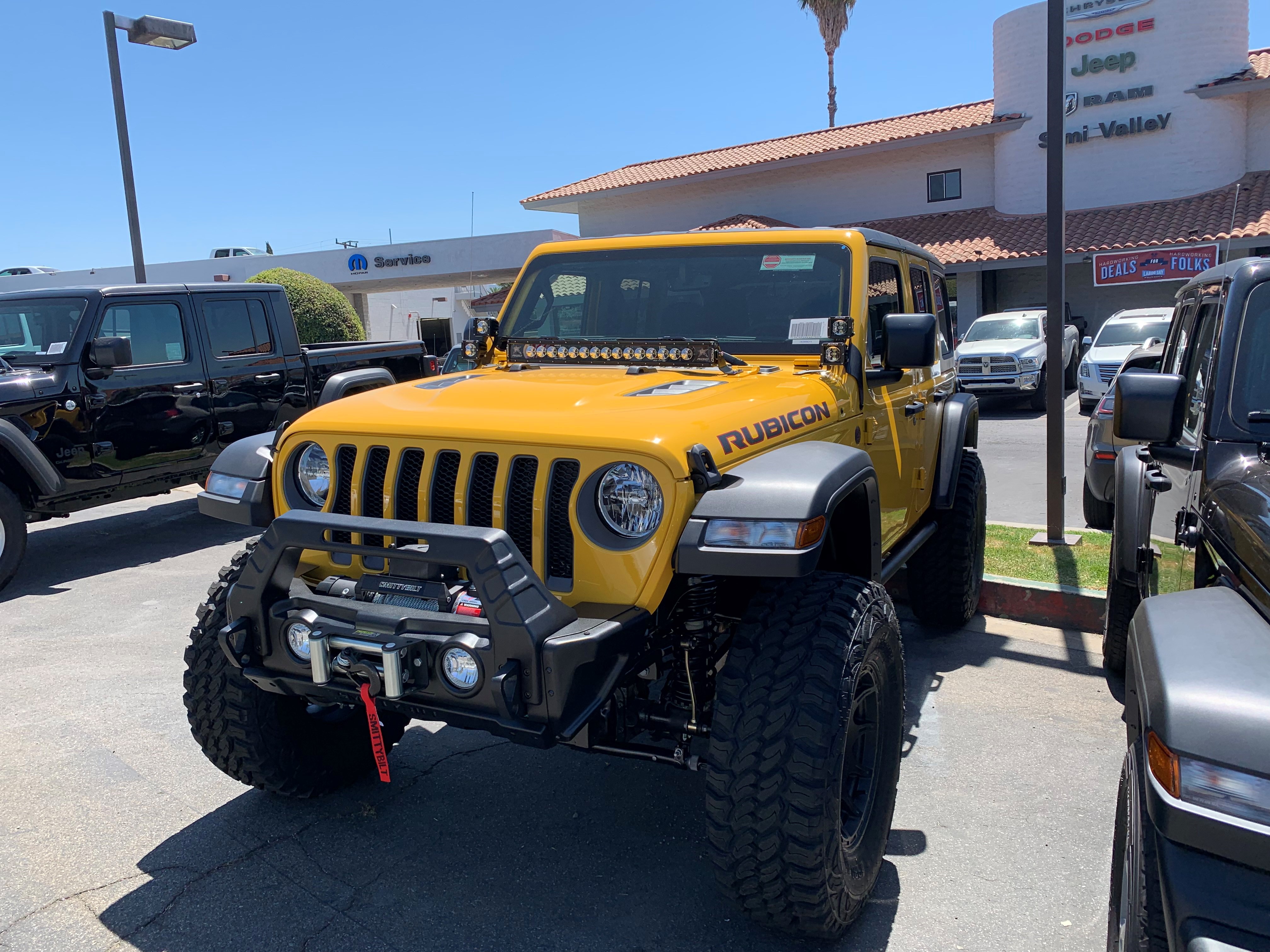 lifted JK Wrangler 2014 Dune color with Atlas bumpers from DSI